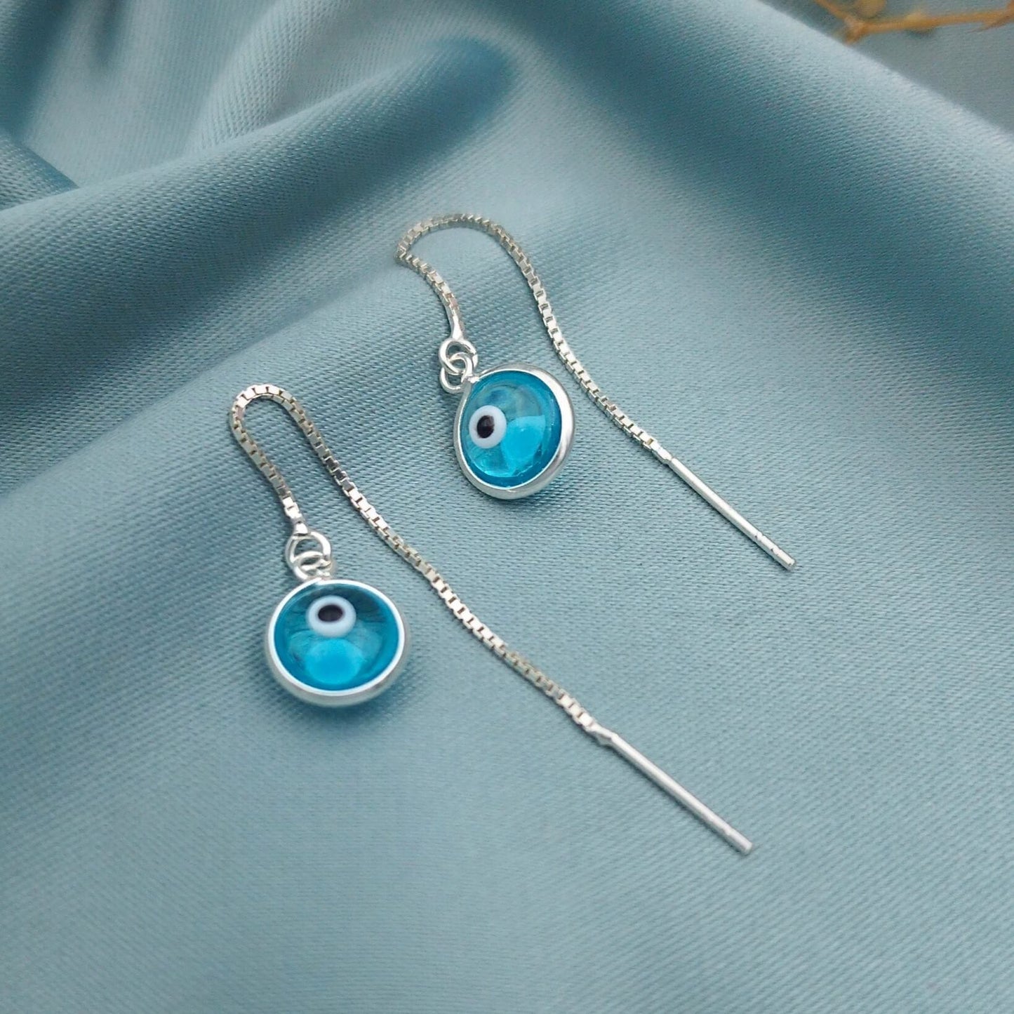 Aretes largos doble ojo turco