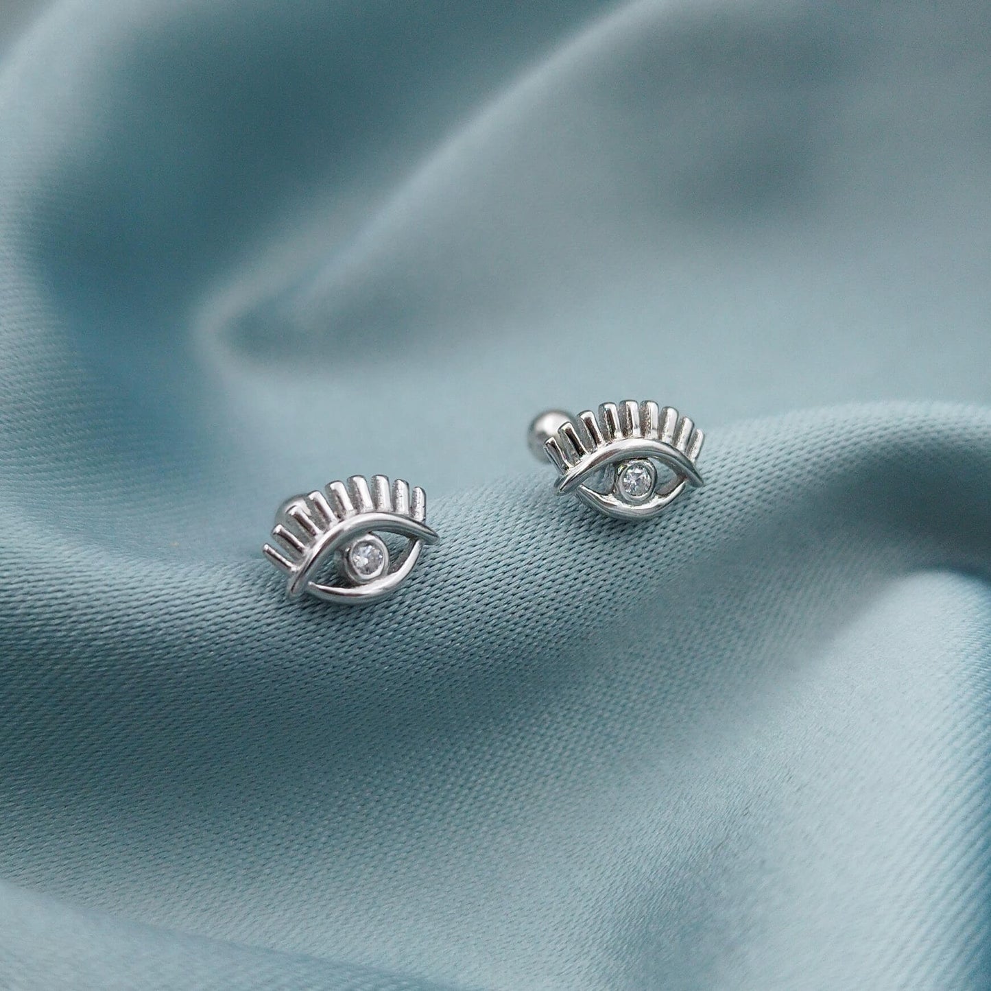 Aretes a rosca ojos