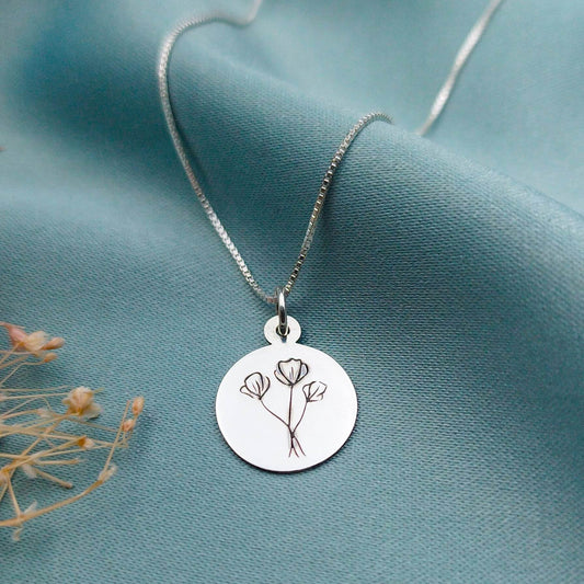 Dije placa redonda 2cm con grabado