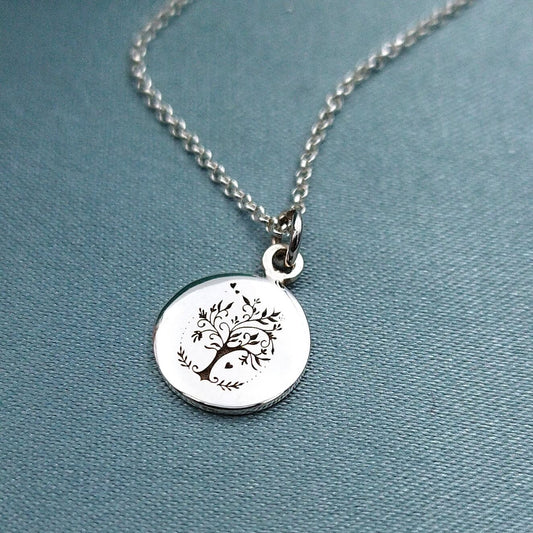 Dije placa redonda 1cm con grabado