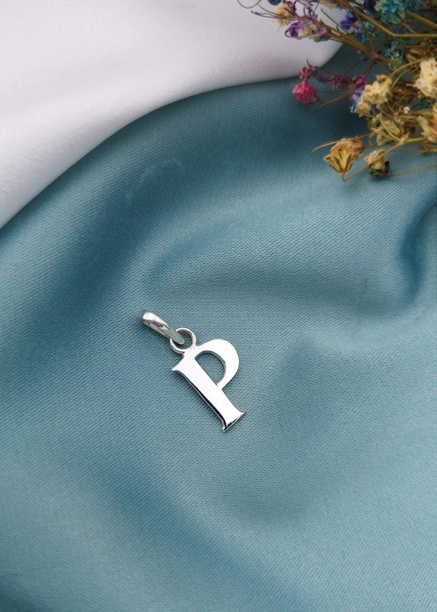 Dije letra P mayúscula