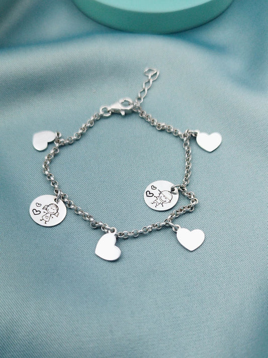 Pulsera Rolo dijes redondos y corazones
