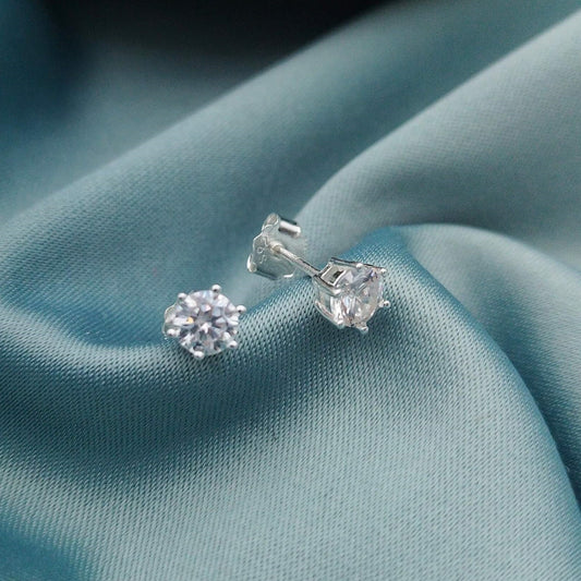 Aretes circón 6 garras