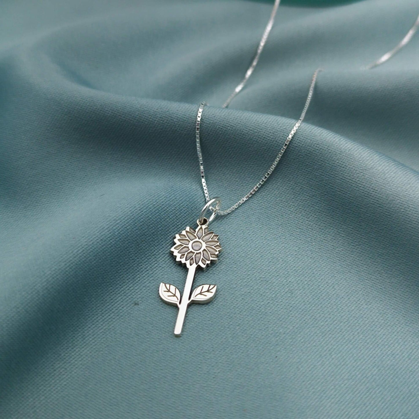 Dije Girasol con rama