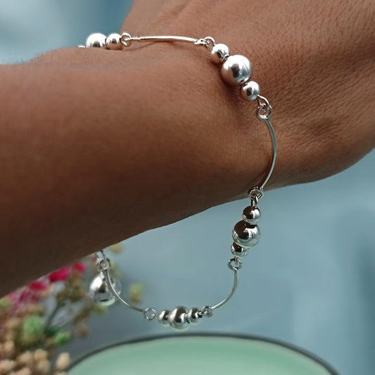 Pulsera Bolitas Llamador