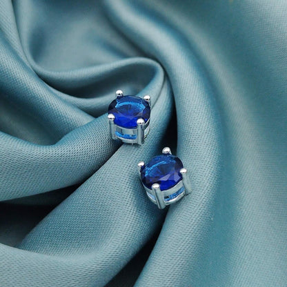 Aretes circón con caja plana