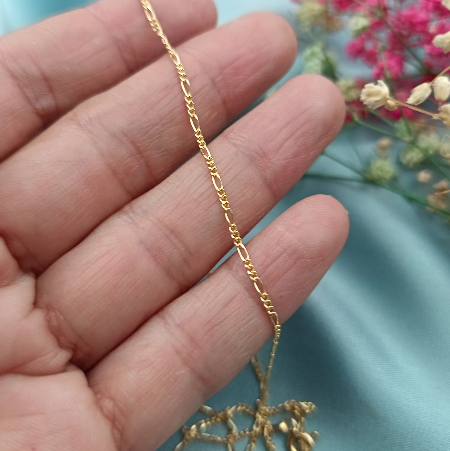 Cadena Fígaro 2L 1mm dorado