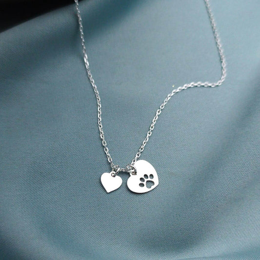 Collar corazón y corazón con patita de perro