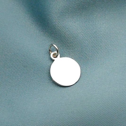 Dije placa redonda 1cm con grabado