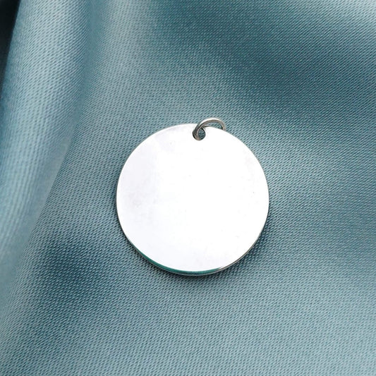 Dije placa redonda 2cm con grabado