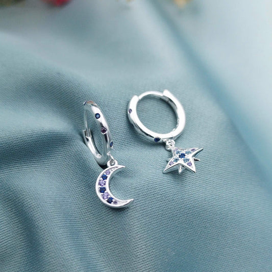 Huggies con dijes de estrella y luna