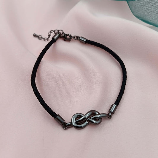 Pulsera cuero trenzado con nudo infinito