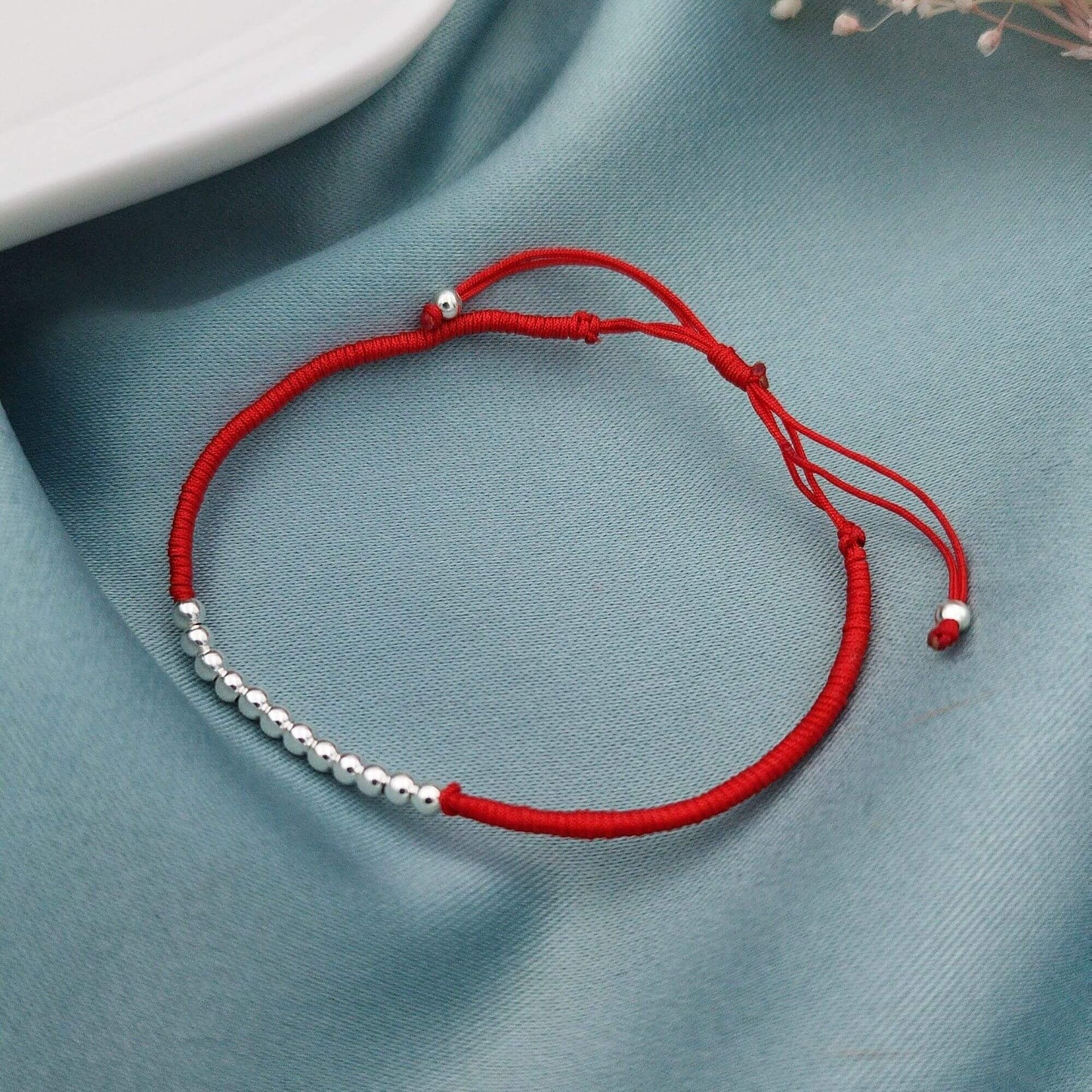 Pulsera Bolitas e Hilo enrollado