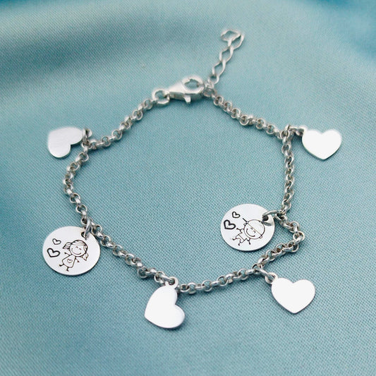 Pulsera Rolo dijes redondos y corazones