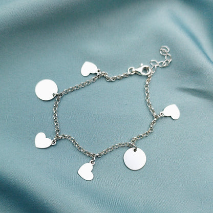 Pulsera Rolo dijes redondos y corazones