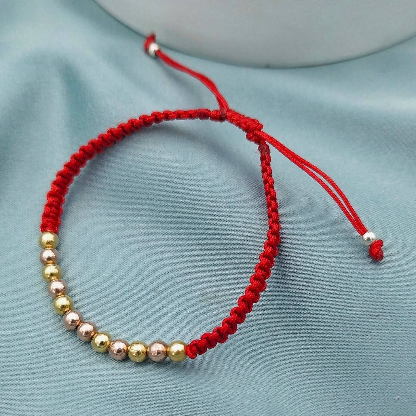 Pulsera macramé Cuentas doradas y rosé