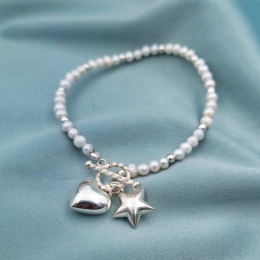 Pulsera perlas con corazón y estrella inflados