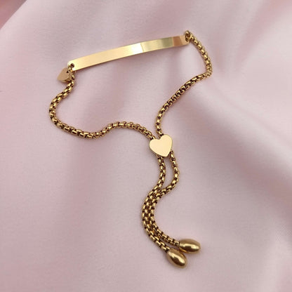 Pulsera Esclava regulable broche corazón (Personalizable)