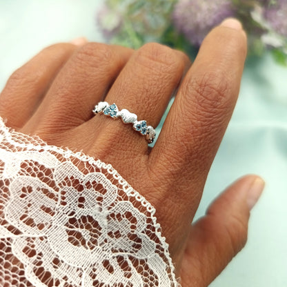 Anillo Corazones brillantes regulable