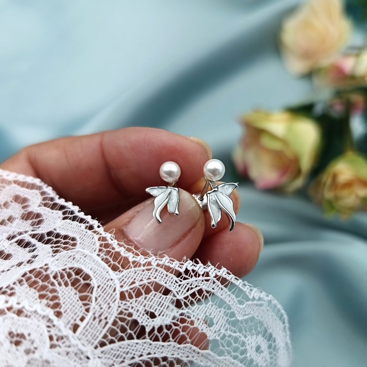 Aretes Perla con hojas