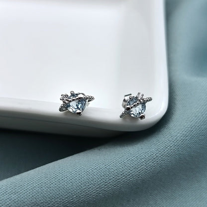 Aretes Saturno