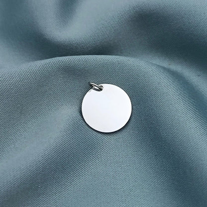 Dije placa redonda 1.5cm con grabado