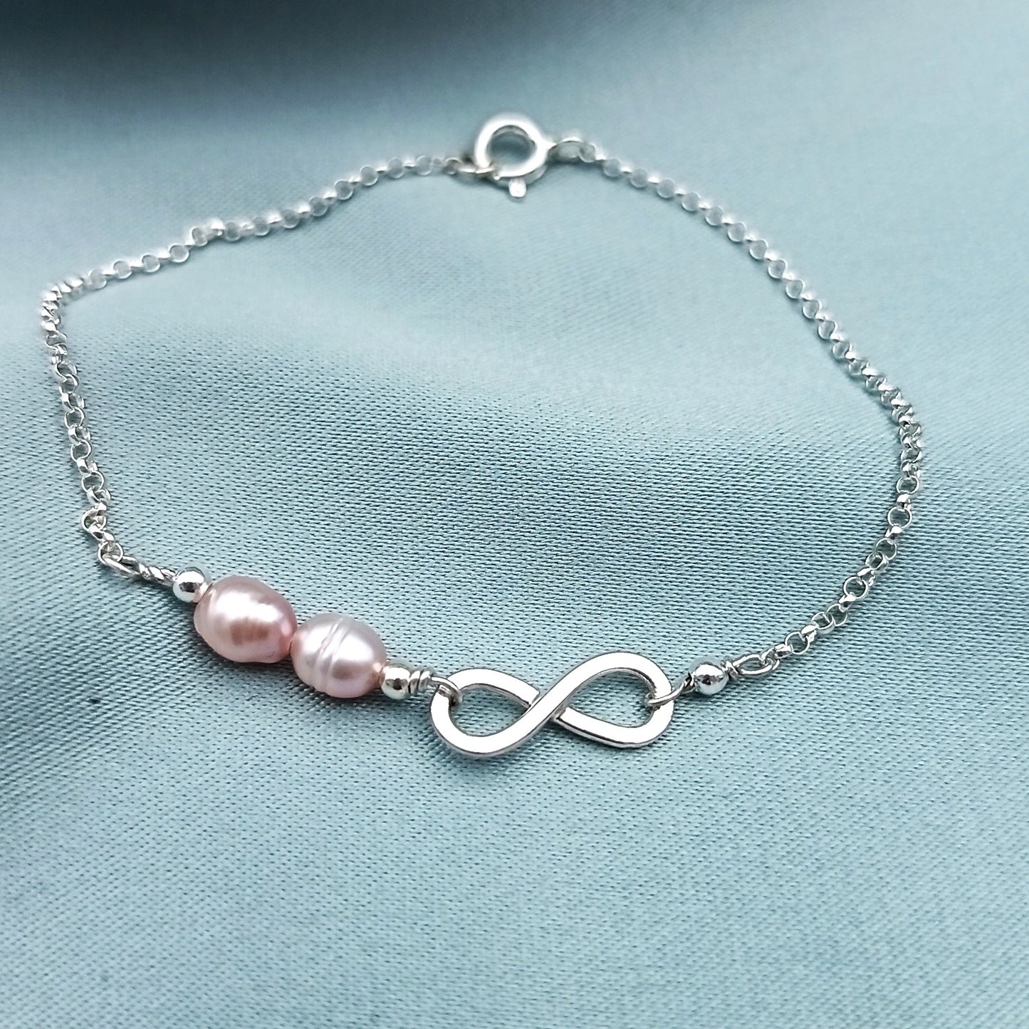 Pulsera Infinito con perlas