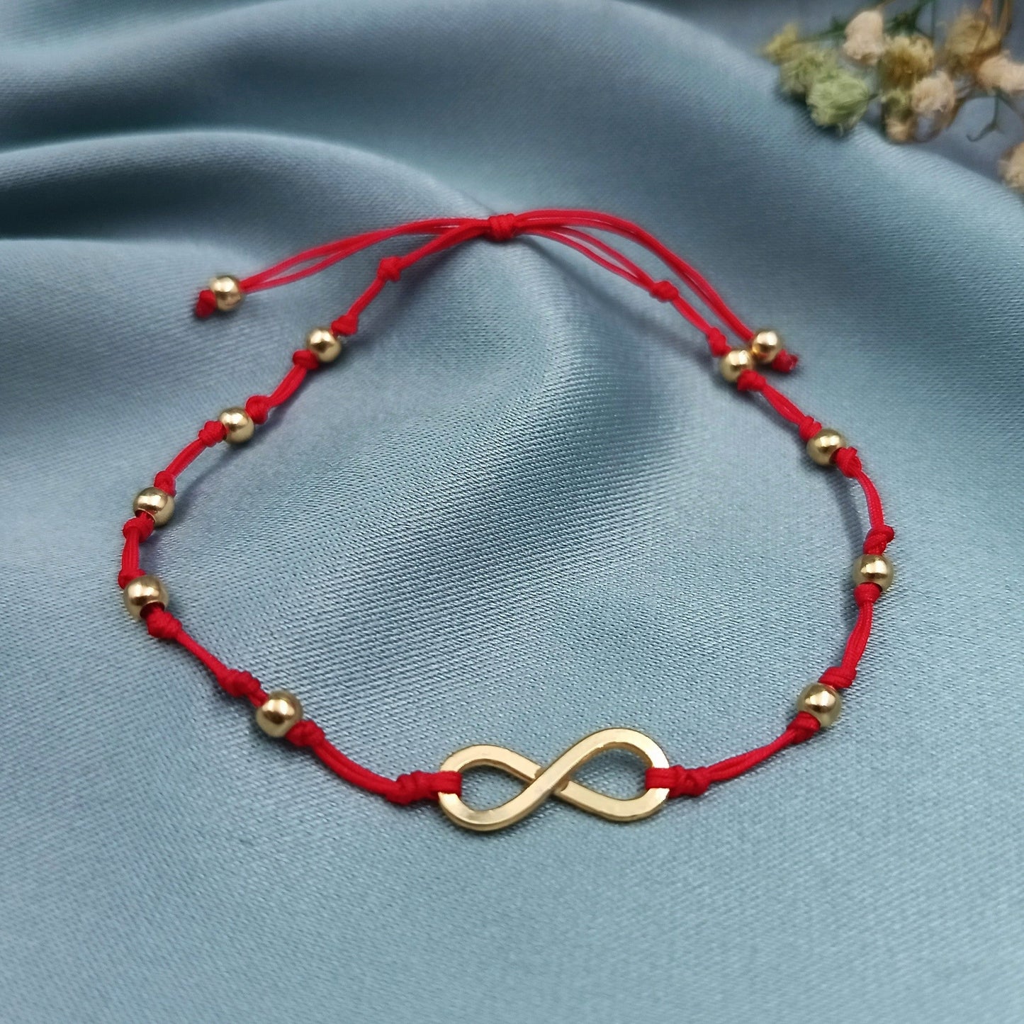 Pulsera infinito artesanal plata chapado en oro