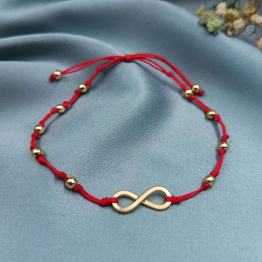 Pulsera infinito artesanal plata chapado en oro